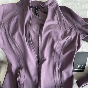 90 degrees sport zip up with pockets.